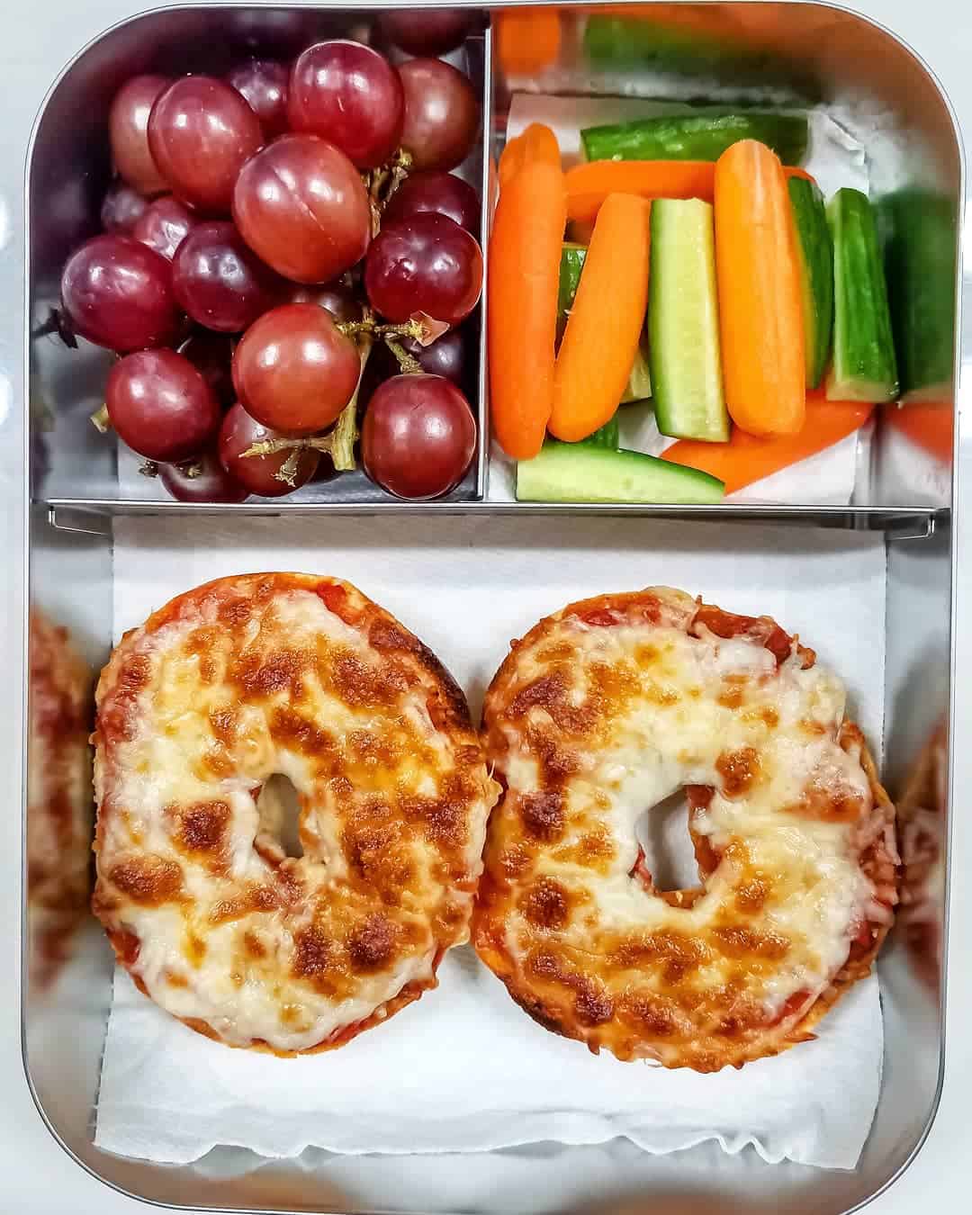 bagel pizza, cucumber & carrot sticks,red grapes