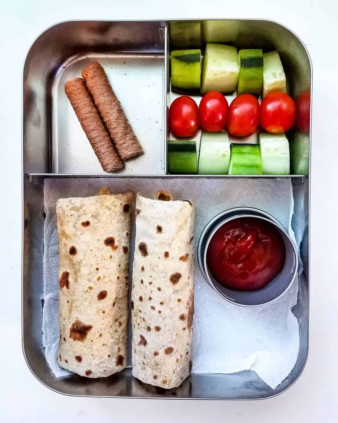 Bean and Cheese Burritos, chocolate coconut rolls and cucumber, cherrytomatoes