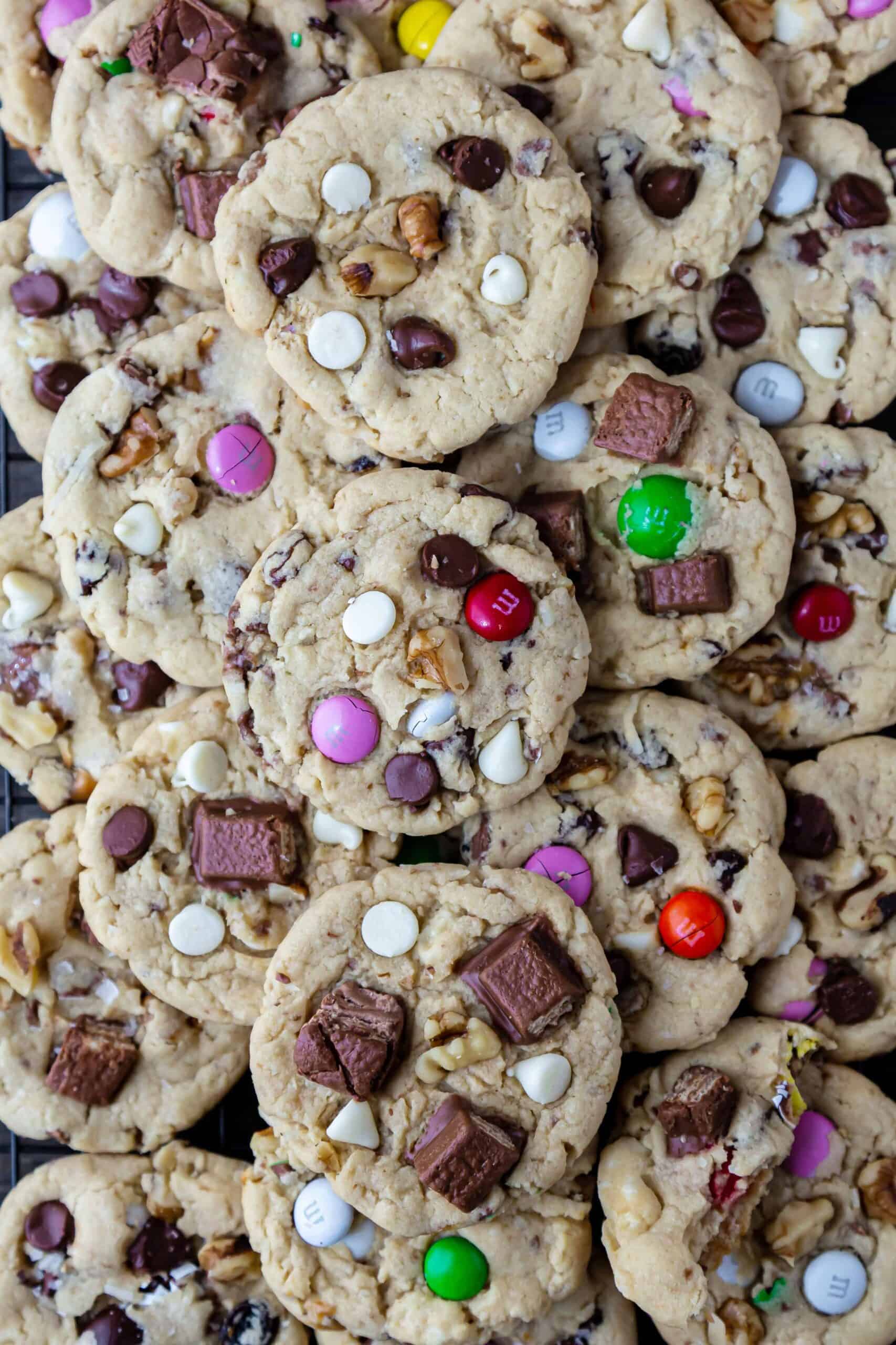 stack of Eggless Kitchen Sink Cookies loaded with choc chips, M&M's walnuts, raisins.