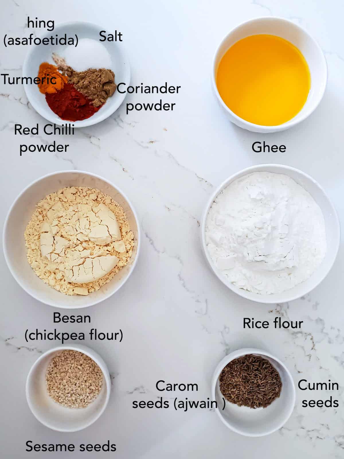Chakli Ingredients in bowl on white surface