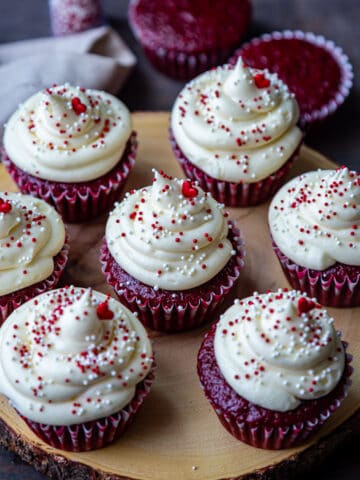 Red Velvet cupcakes on a wooden tray