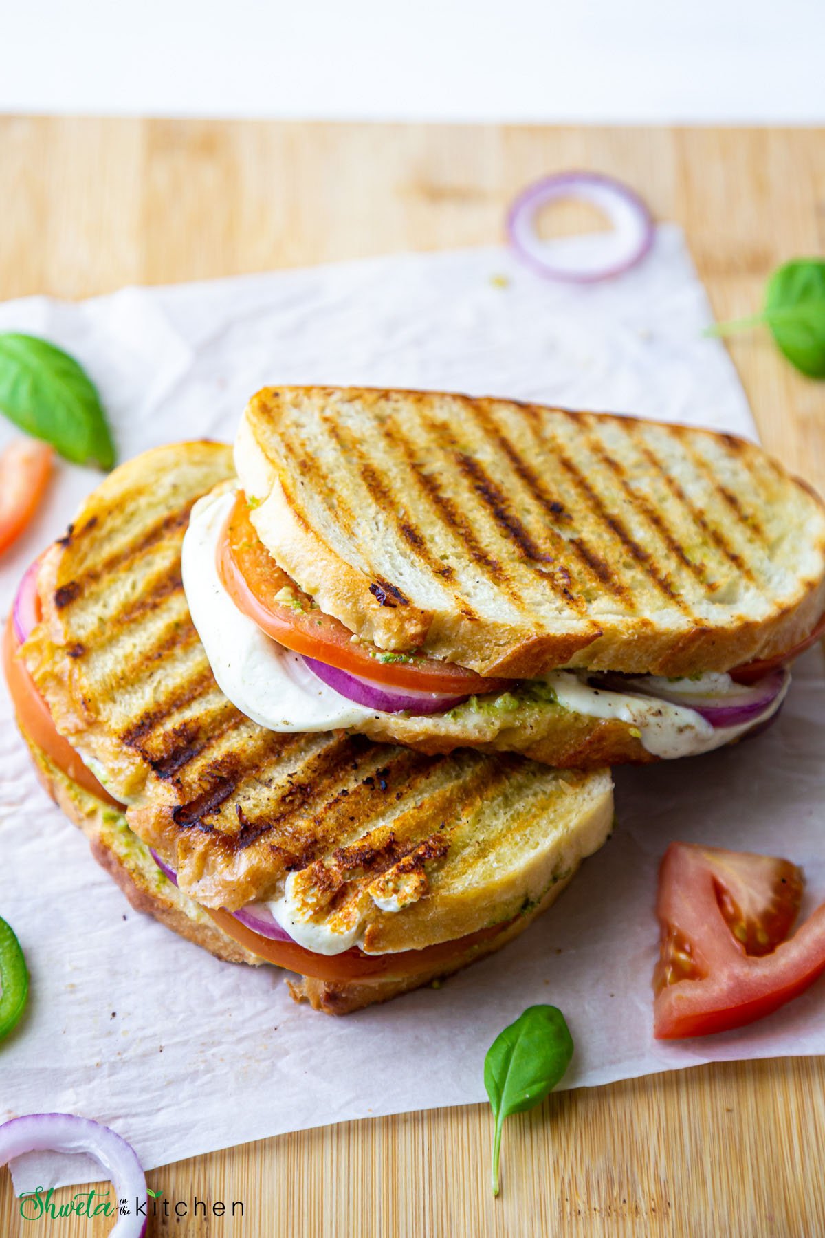 Two caprese panini stacked on each other