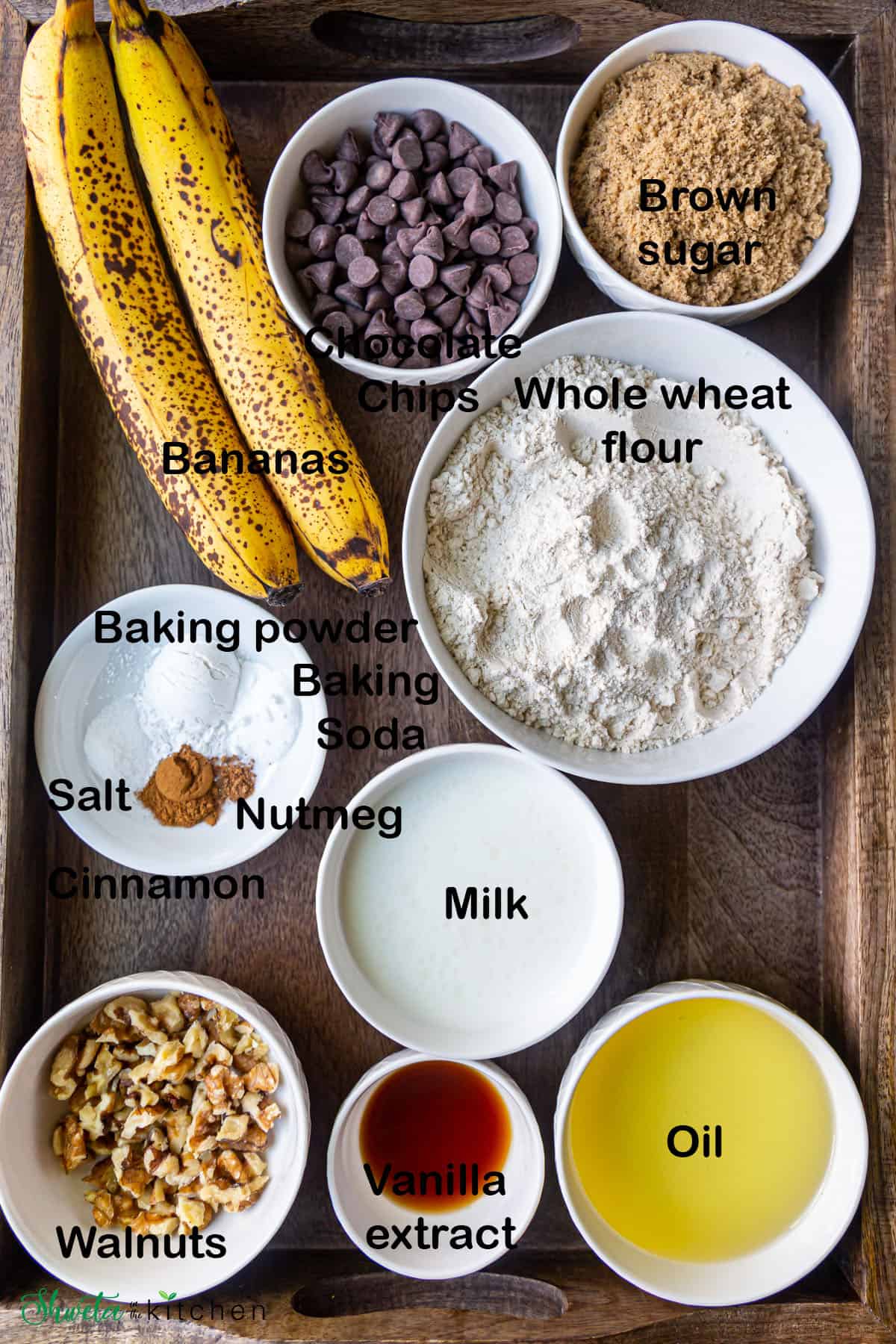 Ingredients for eggless Banana Chocolate Chip Muffins placed in bowls