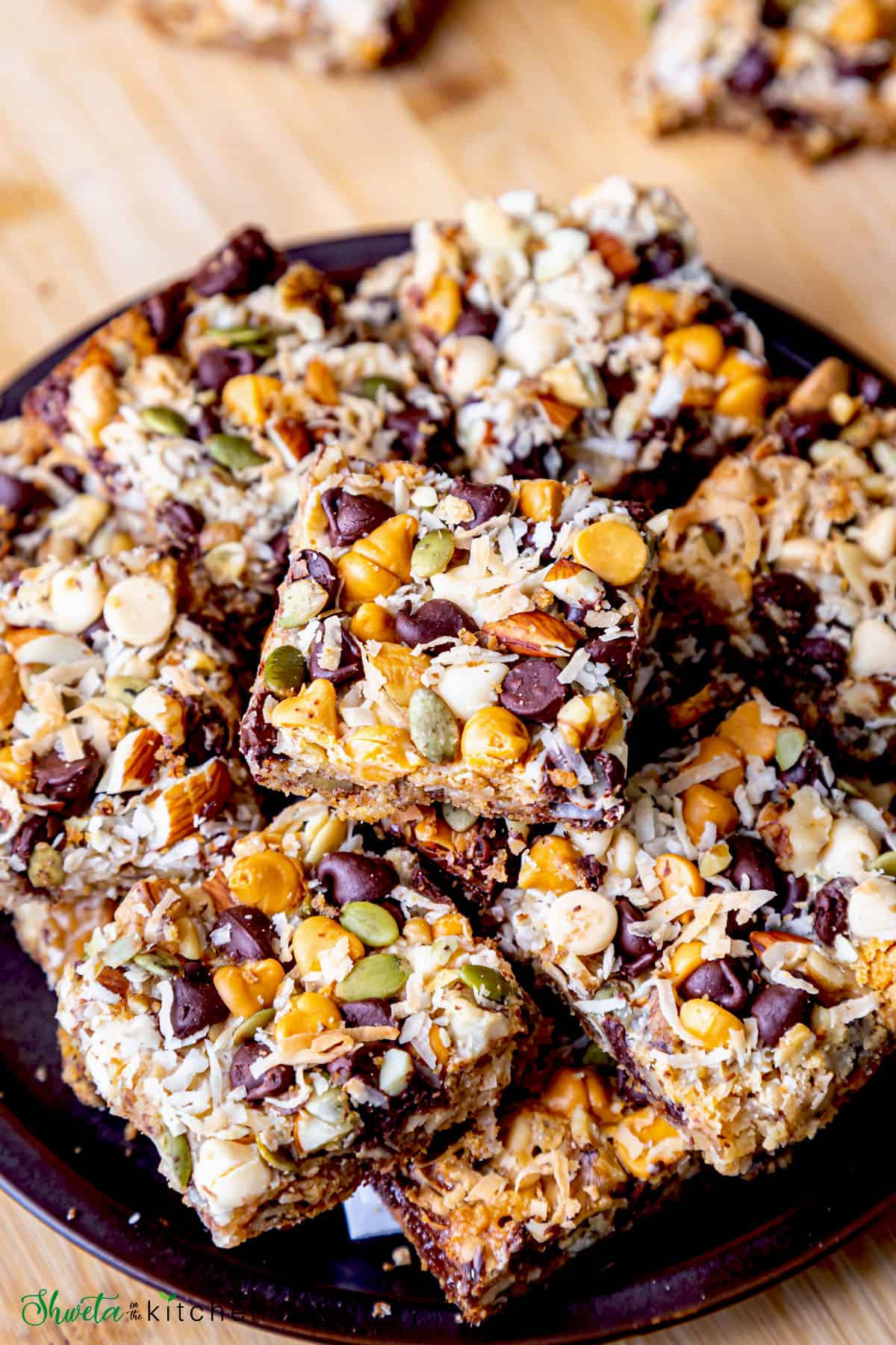 Plate full of magic bars piled on top each other