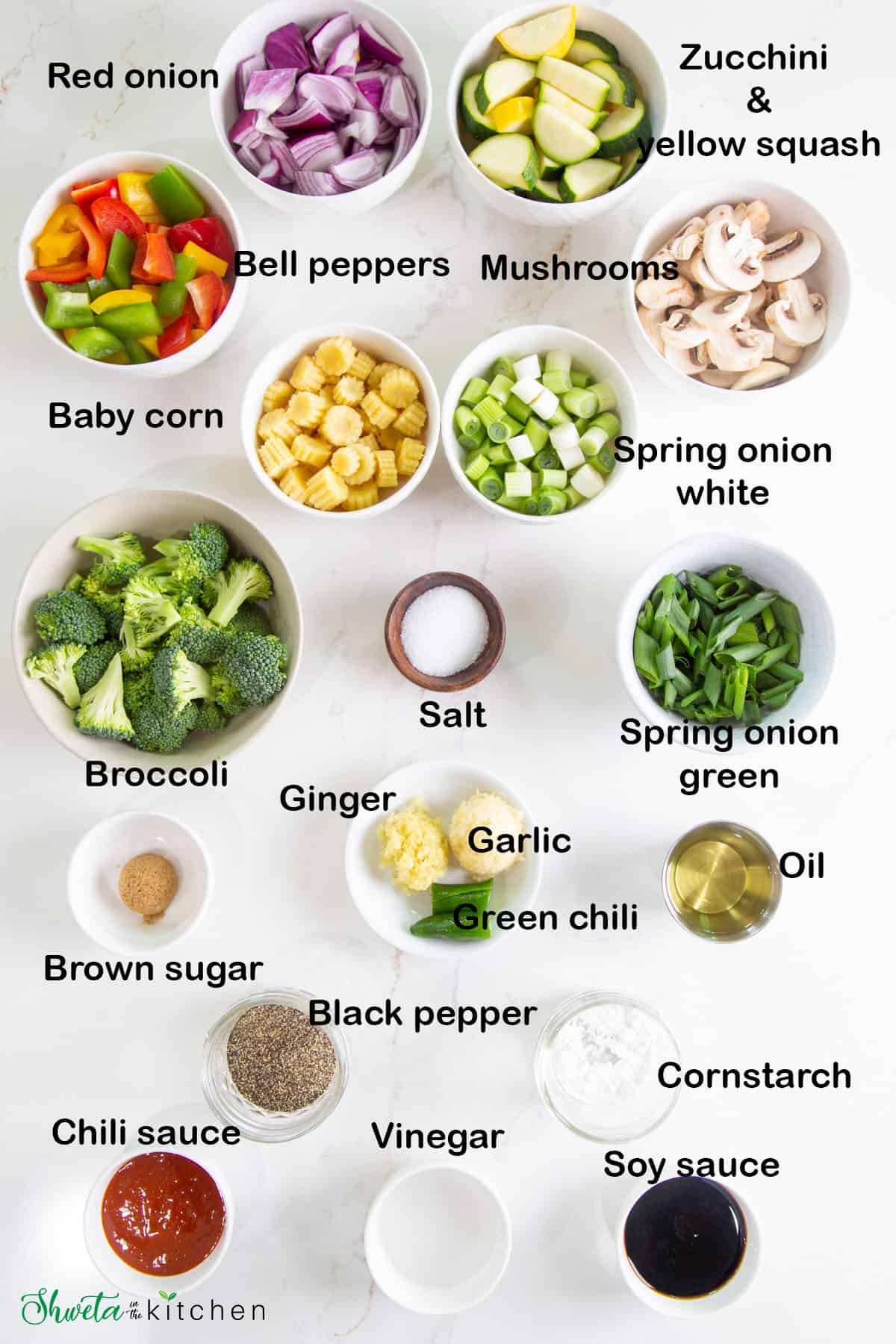 Ingredients for vegetables in hot garlic sauce in bowls on white surface