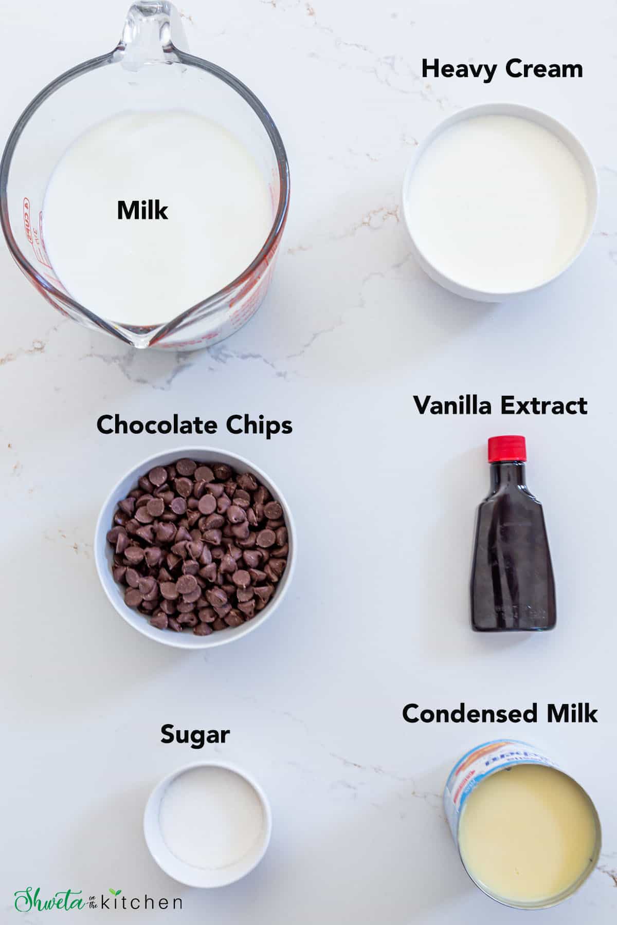 Hot Chocolate ingredients on a white surface